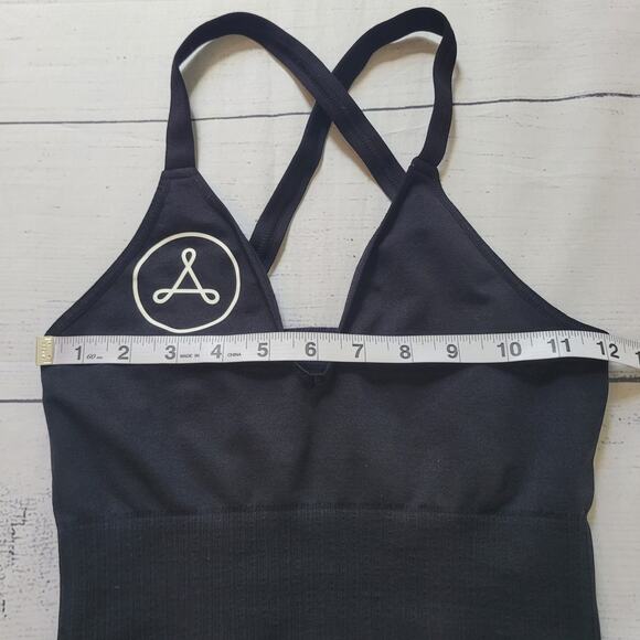 Free People Movement Size XS Good Karma Crop Tank Black Cross Back Symbol Front - Picture 4 of 6